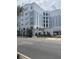 Exterior view of the building featuring a well-maintained facade, manicured landscaping, and signage at 204 E South St # 5057, Orlando, FL 32801