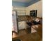 Kitchen featuring stainless steel appliances, stone countertops, and ample cabinetry at 204 E South St # 5057, Orlando, FL 32801