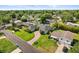 Lovely aerial shot of the home displaying a well maintained yard, attractive landscaping and a long driveway at 2527 Mohawk Trl, Maitland, FL 32751