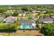 Stunning aerial view of the home featuring a large backyard with a pool and patio area at 2527 Mohawk Trl, Maitland, FL 32751