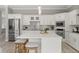 Modern kitchen with large island, stainless steel appliances, and ample countertop space at 2527 Mohawk Trl, Maitland, FL 32751