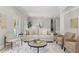 Cozy living room featuring a comfortable sofa, a modern coffee table and a stylish rug at 2527 Mohawk Trl, Maitland, FL 32751