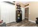 Bedroom with wood floors, closet, and shelves with decorative figurines at 2545 Azzurra Ln, Ocoee, FL 34761