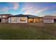 The home has a large backyard and screened patio for outdoor enjoyment at 2680 Lookout Ln, Kissimmee, FL 34746