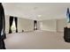 Large bonus room featuring carpet, neutral walls, black curtains and plenty of space at 2680 Lookout Ln, Kissimmee, FL 34746
