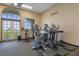 Gym with stationary bikes and elliptical machines overlooking the outdoors at 2680 Lookout Ln, Kissimmee, FL 34746