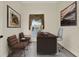 Home office featuring a desk, seating, and a view to the outdoors at 2680 Lookout Ln, Kissimmee, FL 34746
