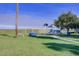 Lush green playground area, with play structures and swings, offering a fun recreational space for and families at 2680 Lookout Ln, Kissimmee, FL 34746