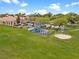 Aerial view of the playground, a covered picnic area, and a building at 2680 Lookout Ln, Kissimmee, FL 34746