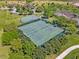 Overhead shot of the tennis and basketball courts in a well-maintained community at 2680 Lookout Ln, Kissimmee, FL 34746