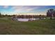 Scenic water view with docks and lush green surroundings offering serene living and outdoor enjoyment at 2680 Lookout Ln, Kissimmee, FL 34746