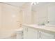 Well-lit bathroom with vanity, sink, mirror and combination shower and tub at 3038 Clubview Dr # Ge, Orlando, FL 32822