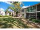 This beautiful townhouse has mature trees, manicured lawns, and a relaxing screened patio at 3038 Clubview Dr # Ge, Orlando, FL 32822