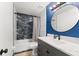 Remodeled bathroom features a modern vanity, updated fixtures, and tiled shower at 3121 Heartwood Ave, Winter Park, FL 32792