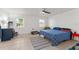 Bedroom with tile floor, ceiling fan, and natural light at 3121 Heartwood Ave, Winter Park, FL 32792