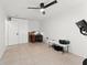 Open room features tile floor, storage, and workout area at 3121 Heartwood Ave, Winter Park, FL 32792