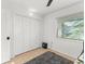 Bedroom with window and closet for storage, complete with carpet and fan at 3121 Heartwood Ave, Winter Park, FL 32792