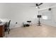 Bright room has tile floor, ceiling fan, and multiple windows at 3121 Heartwood Ave, Winter Park, FL 32792