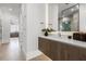 Modern bathroom with a sleek vanity, minimalist design, and contemporary fixtures for a spa-like experience at 3322 Helen Ave, Orlando, FL 32804