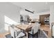 Open floor plan with dining area connecting to a modern kitchen, featuring lots of natural light at 3322 Helen Ave, Orlando, FL 32804