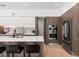 Contemporary kitchen featuring a sleek island, modern appliances, and stylish cabinetry at 3322 Helen Ave, Orlando, FL 32804