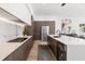 Modern kitchen featuring stainless steel appliances, a gas range, and marble countertops at 3322 Helen Ave, Orlando, FL 32804
