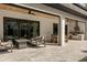 Inviting outdoor patio with comfortable seating and a built in summer kitchen, perfect for entertaining guests at 3322 Helen Ave, Orlando, FL 32804