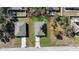 An aerial view of the property shows a well-maintained lot, offering ample space and privacy in a desirable location at 355 Gardenia Ct, Kissimmee, FL 34759