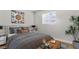 Comfortable bedroom with decorative prints and a stylish, relaxing design at 355 Gardenia Ct, Kissimmee, FL 34759