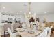Elegant dining room with luxury appointments open to the kitchen at 355 Gardenia Ct, Kissimmee, FL 34759