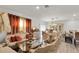 Luxurious dining room with an ornate dining set, chandelier, and elegant decor at 355 Gardenia Ct, Kissimmee, FL 34759