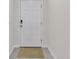 A secure front door with an electronic lock welcomes you into this comfortable home at 355 Gardenia Ct, Kissimmee, FL 34759