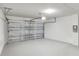 Clean, spacious two-car garage with an automatic door opener and well-lit interior at 355 Gardenia Ct, Kissimmee, FL 34759