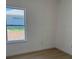 A bedroom featuring a window view to the outside at 4031 Sw 130Th Loop, Ocala, FL 34473