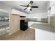 Kitchen with tile floors and stainless steel appliances at 411 Thomas Ave, Frostproof, FL 33843
