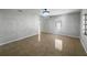Living room with tile flooring and natural light at 411 Thomas Ave, Frostproof, FL 33843