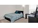 Cozy bedroom with a comfortable bed, soft lighting, and a functional desk at 4180 Bull St, St Cloud, FL 34772