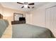 Bedroom with tile flooring, ceiling fan and closet at 449 Martigues Drive, Kissimmee, FL 34759