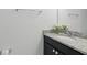 Bathroom featuring a granite vanity with stylish fixtures at 4778 Cragmere Loop, Clermont, FL 34711