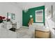 Bright bedroom featuring a modern chandelier, statement wall, and sleek decor at 4778 Cragmere Loop, Clermont, FL 34711