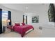 Beautiful bedroom featuring crisp white trim, ample natural light, and stylish decor at 4778 Cragmere Loop, Clermont, FL 34711