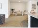 Bright dining area features wood table and seating, modern decor, and ample natural light, creating an inviting space at 4778 Cragmere Loop, Clermont, FL 34711