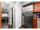 The kitchen has stainless appliances and wood floors and is conveniently located next to the pantry at 5011 Dorian Ave, Belle Isle, FL 32812