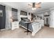 Serene main bedroom featuring large windows, a king bed, and elegant decor at 5011 Dorian Ave, Belle Isle, FL 32812