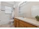 Bathroom featuring a tub and shower combo, single sink, and natural lighting at 5619 Bear Stone Run, Oviedo, FL 32765