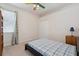 Bedroom with closet and a window letting in natural light at 5619 Bear Stone Run, Oviedo, FL 32765