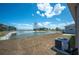 Lush backyard view with a scenic pond, enhancing the property's appeal and providing a serene atmosphere at 752 Trotters Dr, Eagle Lake, FL 33839