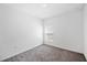 Bedroom with neutral carpet and a bright window overlooking the yard at 752 Trotters Dr, Eagle Lake, FL 33839