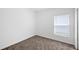 Bedroom featuring neutral carpet and bright window with blinds at 752 Trotters Dr, Eagle Lake, FL 33839