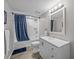 Updated bathroom featuring a shower-tub combo and modern vanity at 831 Retreat Blvd # 103, Davenport, FL 33897